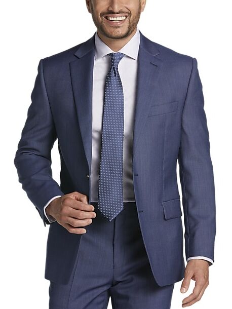 Navy suit with matching tie, top men's suit trends 2023. 