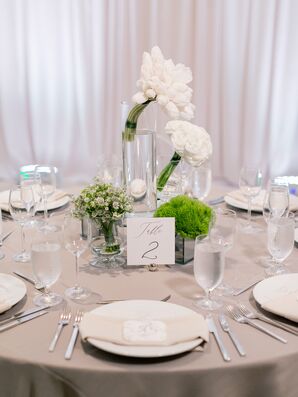 Modern White Floral Centerpieces Atop Gray Linens