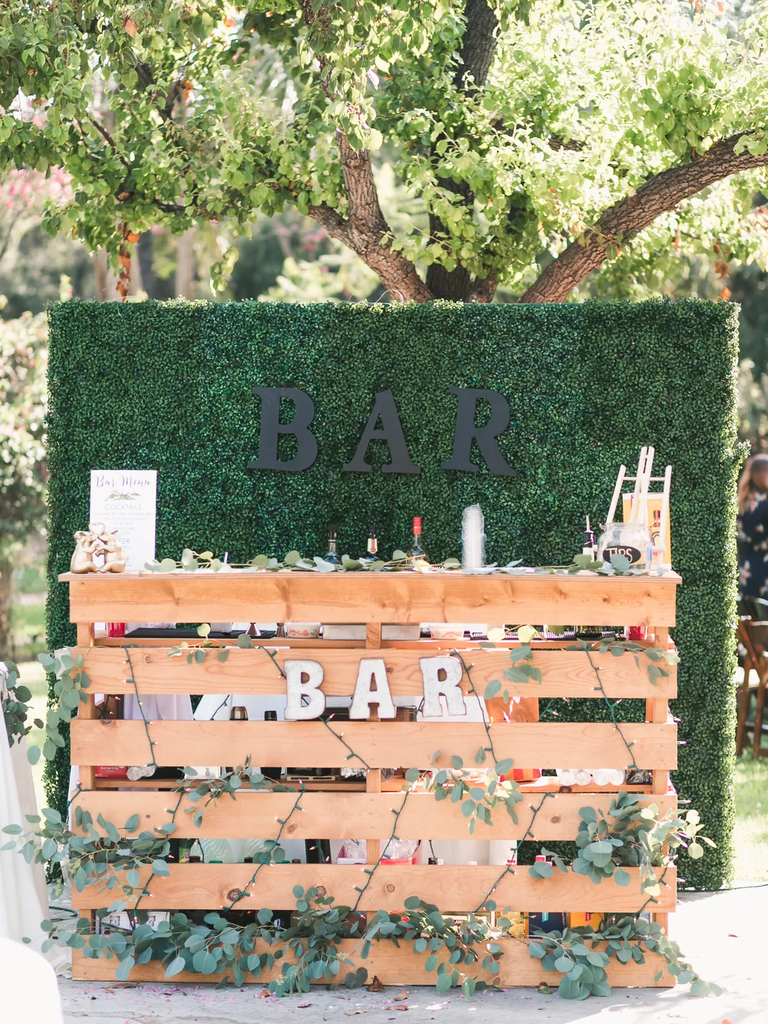 Eucalyptus decor for your outdoor wedding bar