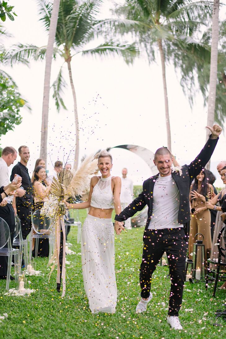 Bride and Groom Recessional Under Cascade of Confetti