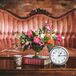 Vintage Clock and Flower Arrangement