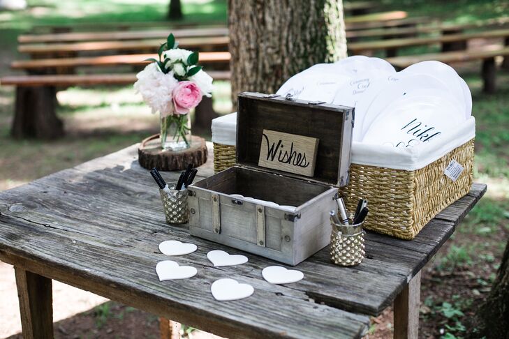 Guests signed wooden hearts instead of a traditional guest book.