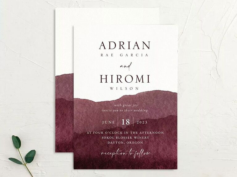 The Knot watercolor wedding invite with mountain painted layered backdrop