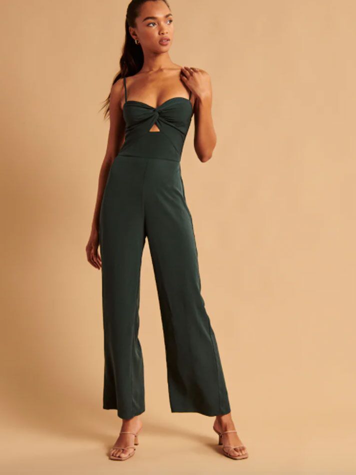 Dark green twist-front fall wedding guest jumpsuit