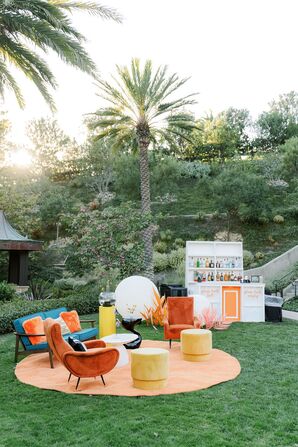 Colorful Orange Lounge Seating at Wedding Cocktail Hour