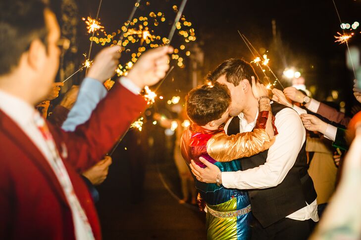 Grooms Kissing During Sparkler Exit