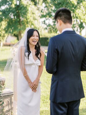 Couple Exchanging Vows During Backyard Minimony