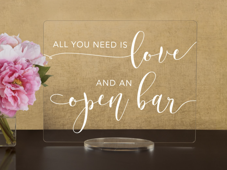 All you need is love acrylic open bar sign with white lettering for wedding