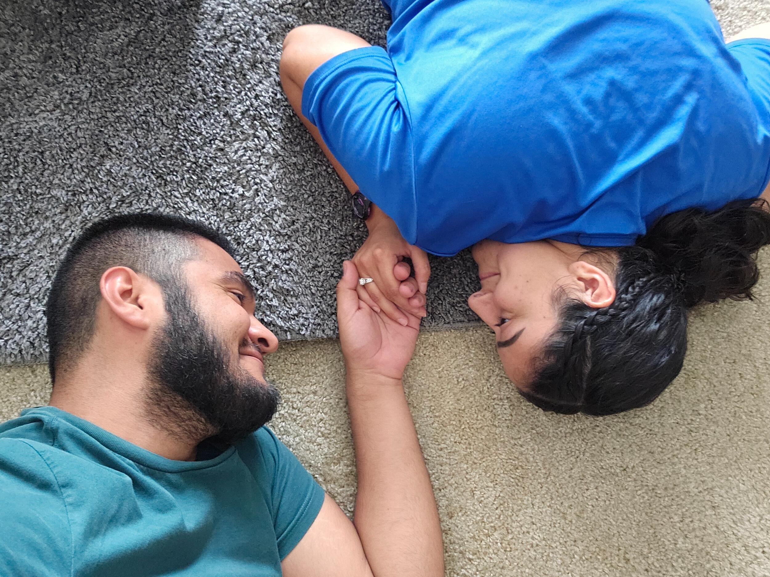 The first photo we took in our first apartment together. We're on the floor because we were pooped from moving furniture up a flight of stairs.