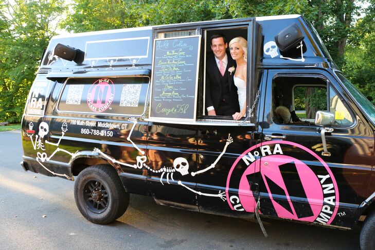 Instead of having a large wedding cake, Lauren and Matt surprised guests with a cupcake food truck. "We handed out epic cupcakes to our guests from the truck with flavors like Peanut Butter Chocolate Explosion and Irish Car Bomb," Lauren says.