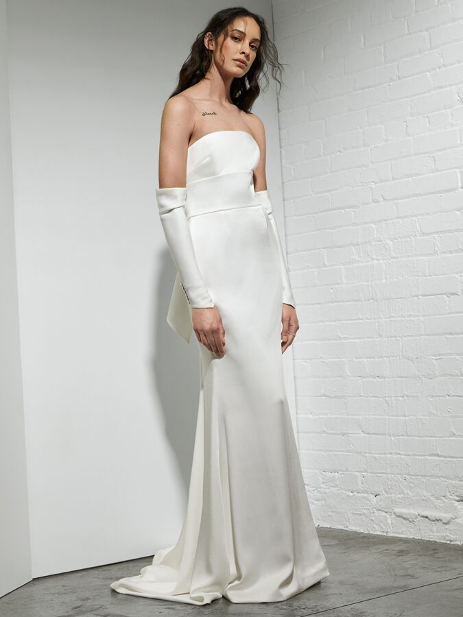 Rivini sheath wedding dress with arched neckline