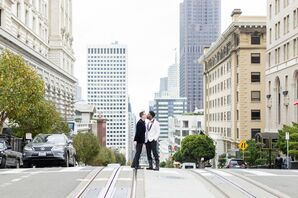 Grooms in Black-and-White Tuxedos Kiss in the Street in San Francisco