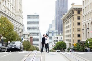 Grooms in Black-and-White Tuxedos Kiss in the Street in San Francisco