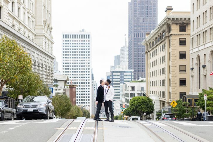 Grooms in Black-and-White Tuxedos Kiss in the Street in San Francisco