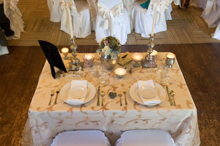 "I handmade hundreds of paper roses and hearts from vintage sheet music and books that we used in flower arrangements, bouquets, boutonnieres, corsages, and centrepieces," says Liz.