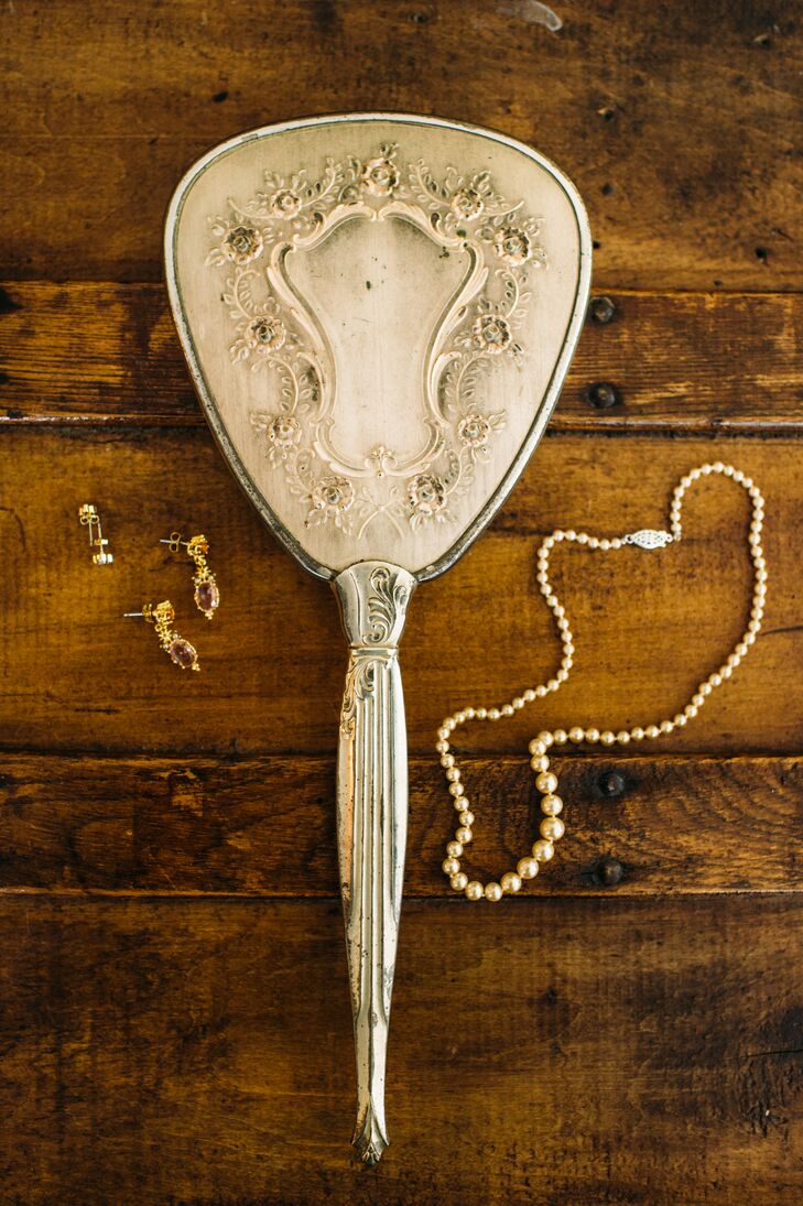 Kim is a huge Disney fan. So it was no surprise that she got ready with an ornate mirror worthy of Cinderella herself. Her accessories also held some personal meaning. Her pearl necklace, however, stood out. “I had recently lost my grandmother, whom I was very close with,” Kim says. “My mother made three strands of pearl necklaces out of her pearls and gave them to my two sisters and me. We all wore them on my wedding day.”