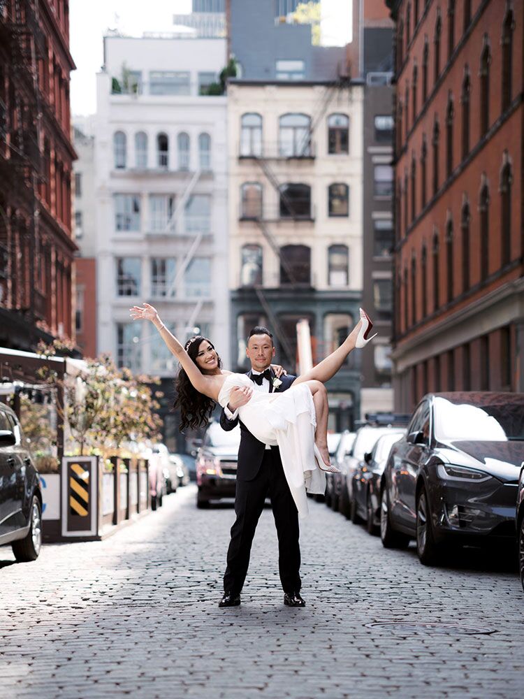 couple posing on street in New York City