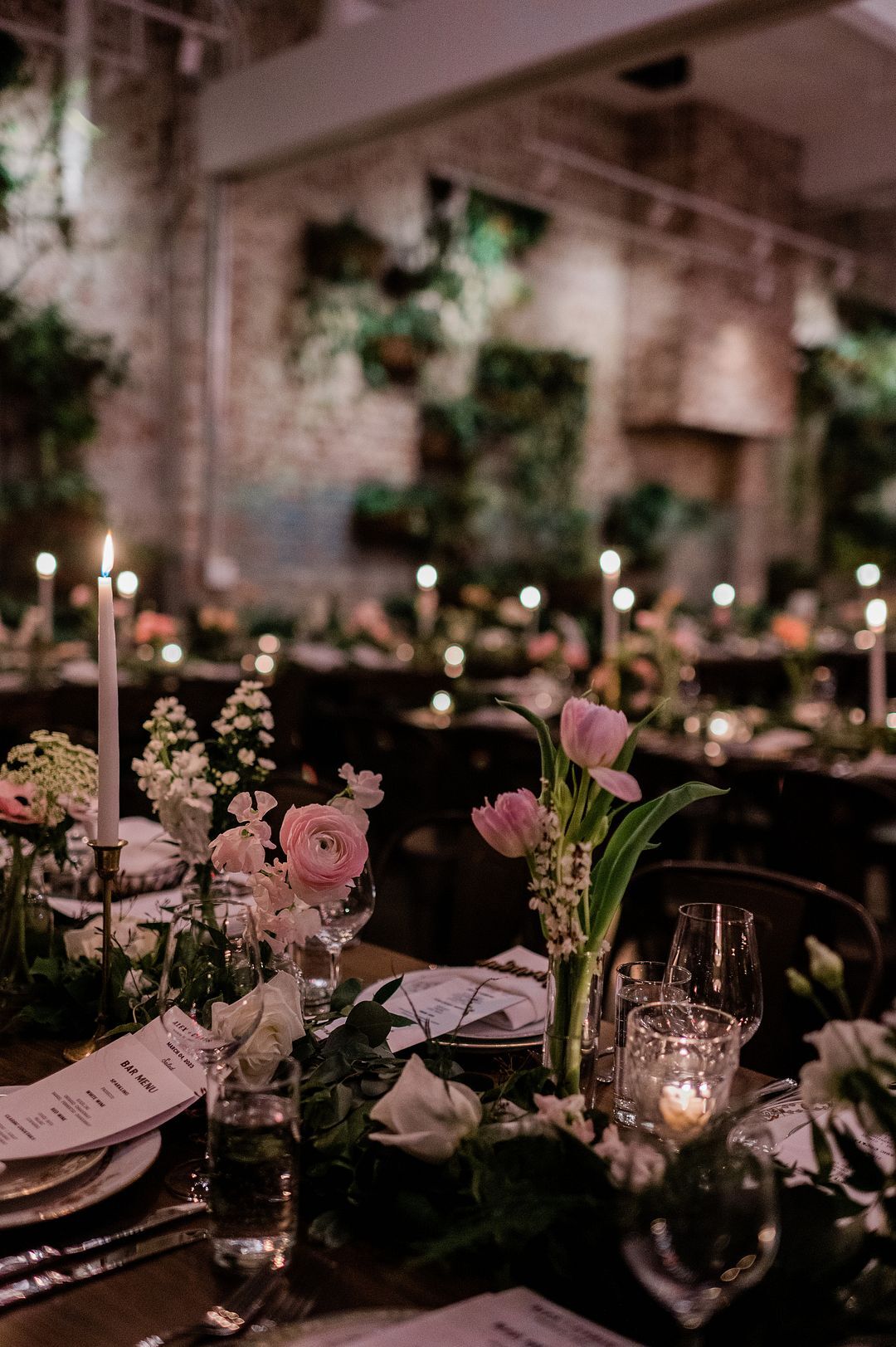 Dimly Lit Reception With Dark Linens, Candles and Minimalistic Blush Centerpieces