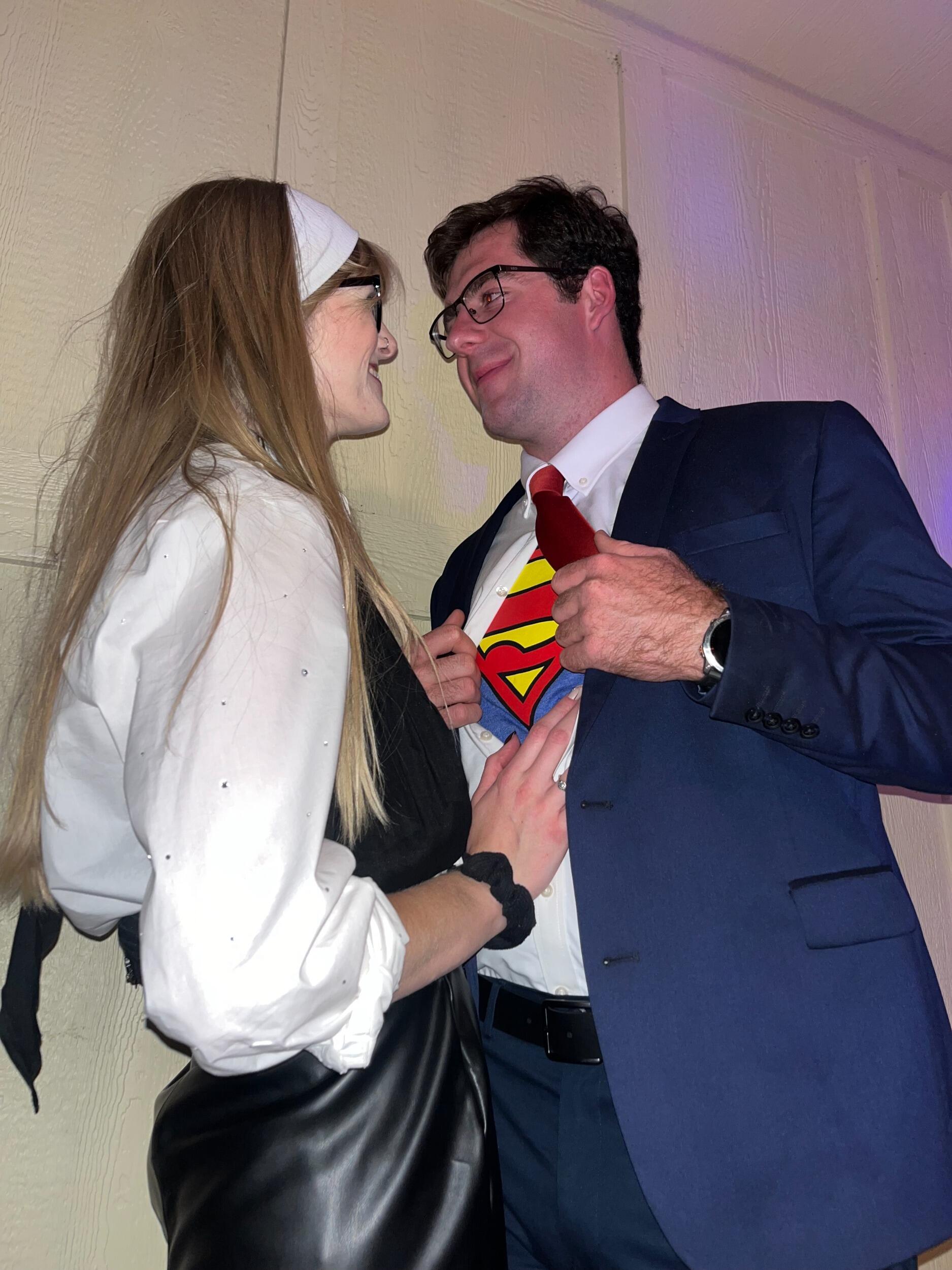 The literal Clark Kent to my Lois Lane.  How can a girl resist a nerdy guy with big muscles, that basically has 'Hometown Hero' as his job? And how can a guy resist a girl that has her nose stuck in a book, a Taylor Swift song stuck in her head, and has some decent self-cut bangs? We were both done for honestly.