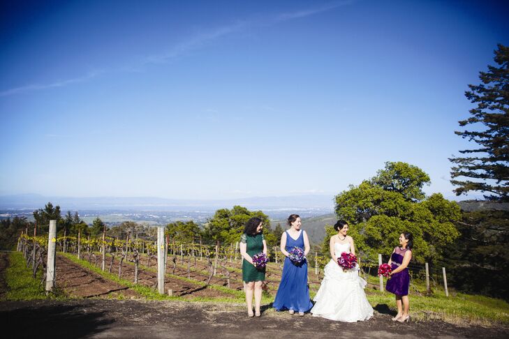 The wedding included two bridesmaids and a groomswoman. I wanted each to have a different dress, in one of the jewel-tone colors, Jennifer says. And I decided that each would have a unique bouquet with a different color theme to complement her dress.