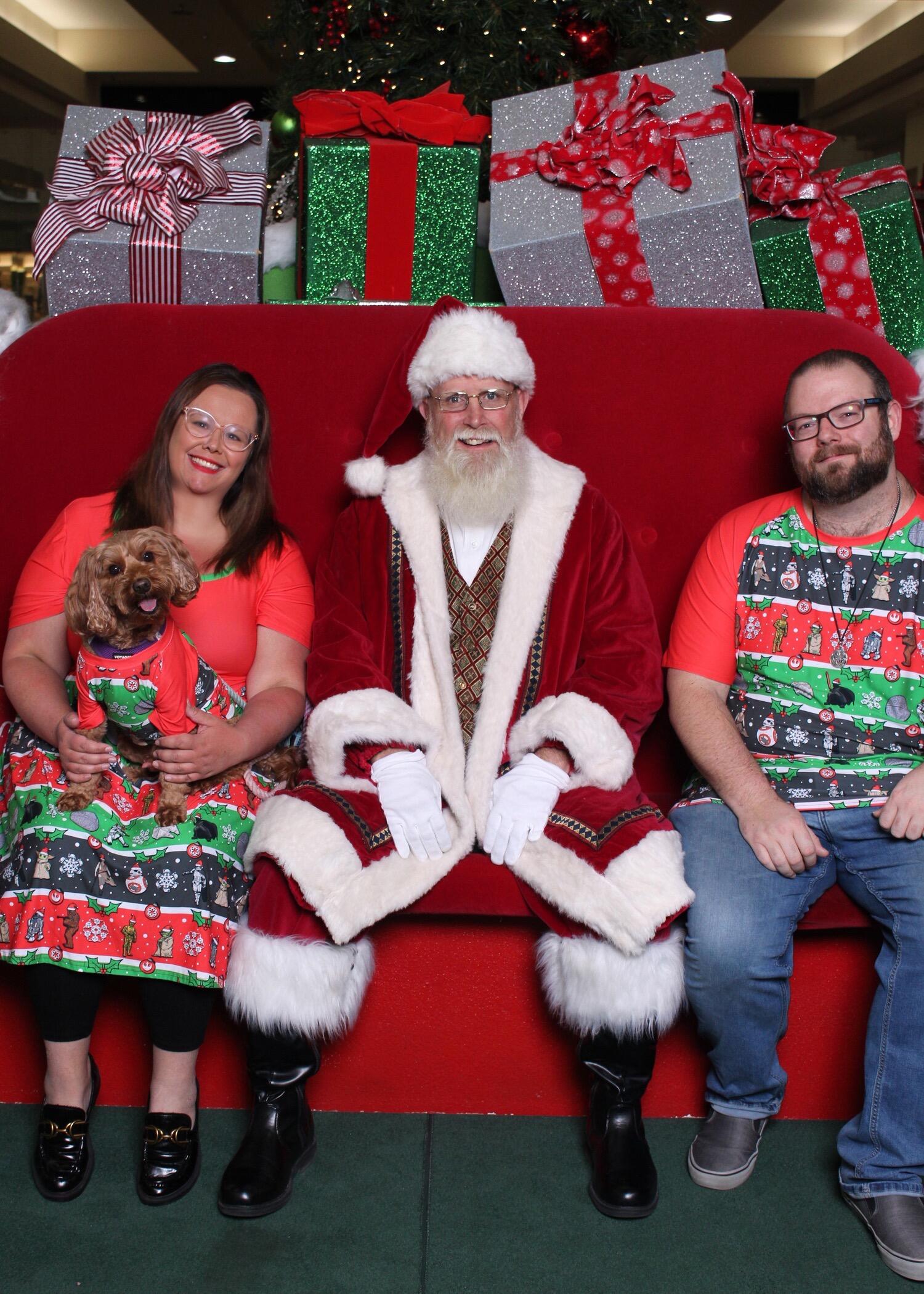 Meeting Santa in matching Star Wars Christmas Attire.