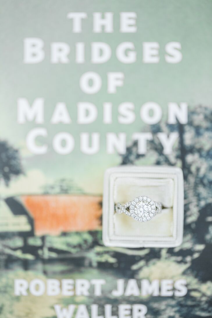 The custom engagement ring was designed by a jeweler in Long Beach, California. Says Italia, “I wanted a round halo diamond with the infinity symbol on both sides to represent that our love is eternal. I also wanted it to have a vintage look.”