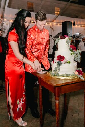 Couple Cutting Cake in Traditional Chinese Dress