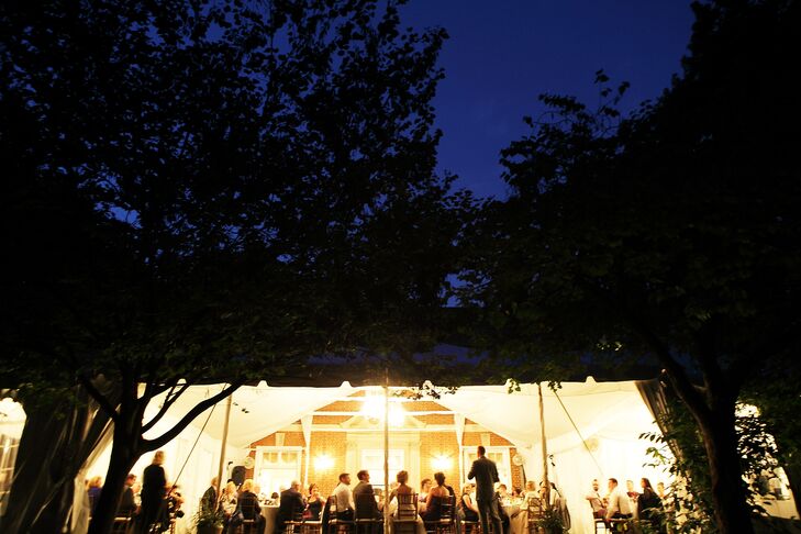 The tented reception was held on the lawn at Woodend Sanctuary. The event was catered by Spilled Milk Catering with music by DJ Brad McCormick.