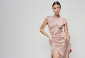 Fitted dress with short sleeves and front slit