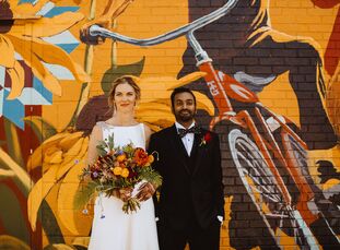 For their eclectic wedding at The Rattlesnake Club in Detroit, Michigan, Brianna and Pavan beautifully blended aspects from their faiths and celebrate