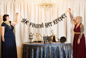 Brown banner saying She found her keeper in HP font