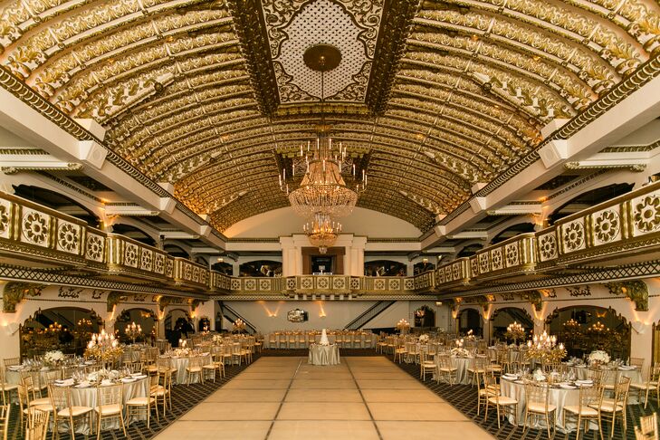 “Joe and I are both from Chicago, so it was only natural that we would get married here,” Jordan says. The Grand Ballroom at Millennium Knickerbocker Hotel Chicago has a lot of gold touches, and the couple complemented this with lots of candlelight and metallic decor.