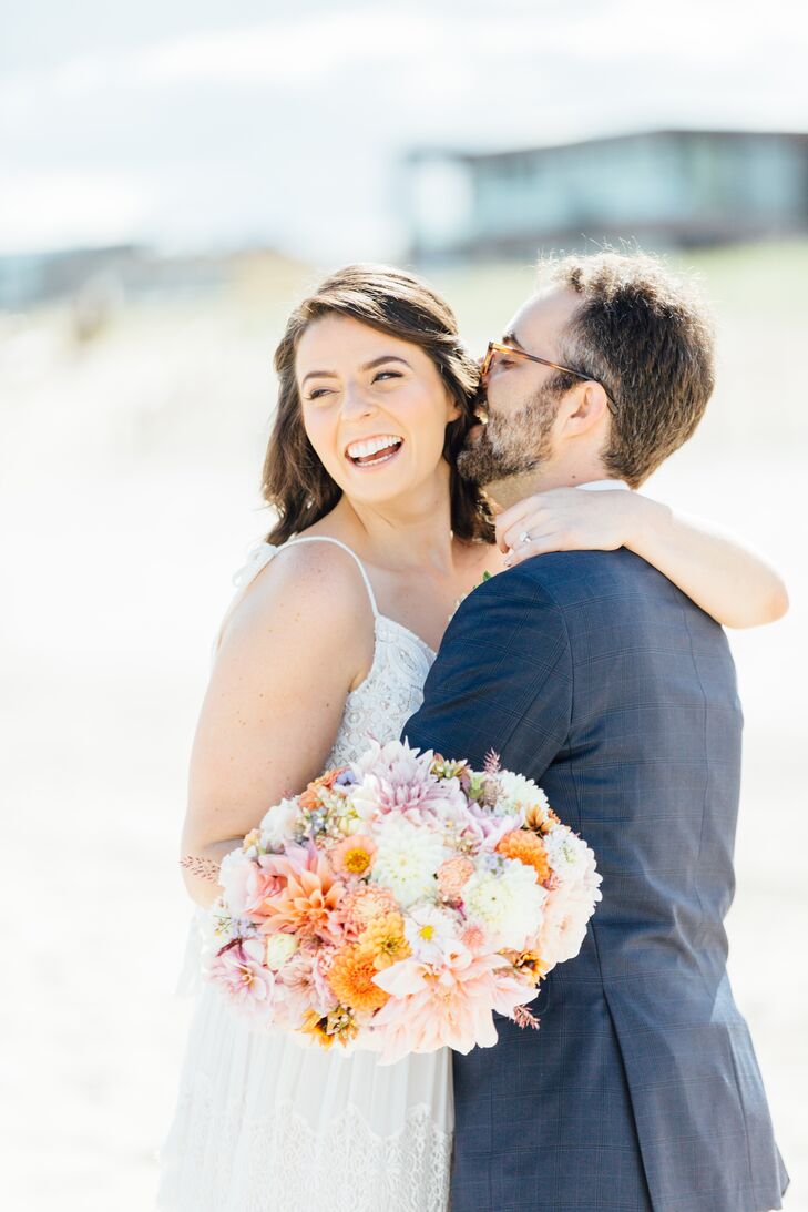 Casual Bride on the Beach with Bright Bouquet of Dahlias