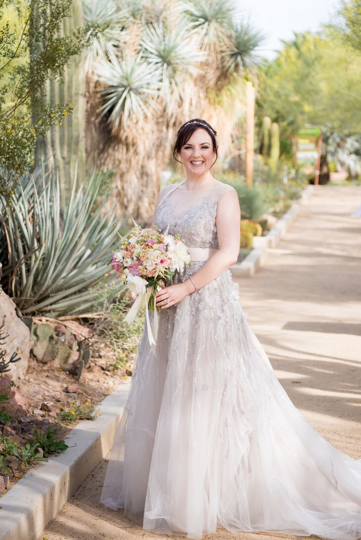 After scouring online sites and looking in traditional wedding dress shops, Anna felt discouraged. The gowns she saw “did nothing to capture my individual style,” she says. When she discovered BHLDN, Anthropologie’s wedding collection, it was “game changing.” “The gowns were not only gorgeous but also funky and fun,” she says. She liked every BHLDN gown she tried on, but wound up falling for the trying-on-one-more-just-for-fun dress (in part because her mom and friend loved it). “I thought it looked too fluffy for my height,” she says. As soon as she put it on, “I knew it was the one,” she says. “I couldn’t stop twirling.”