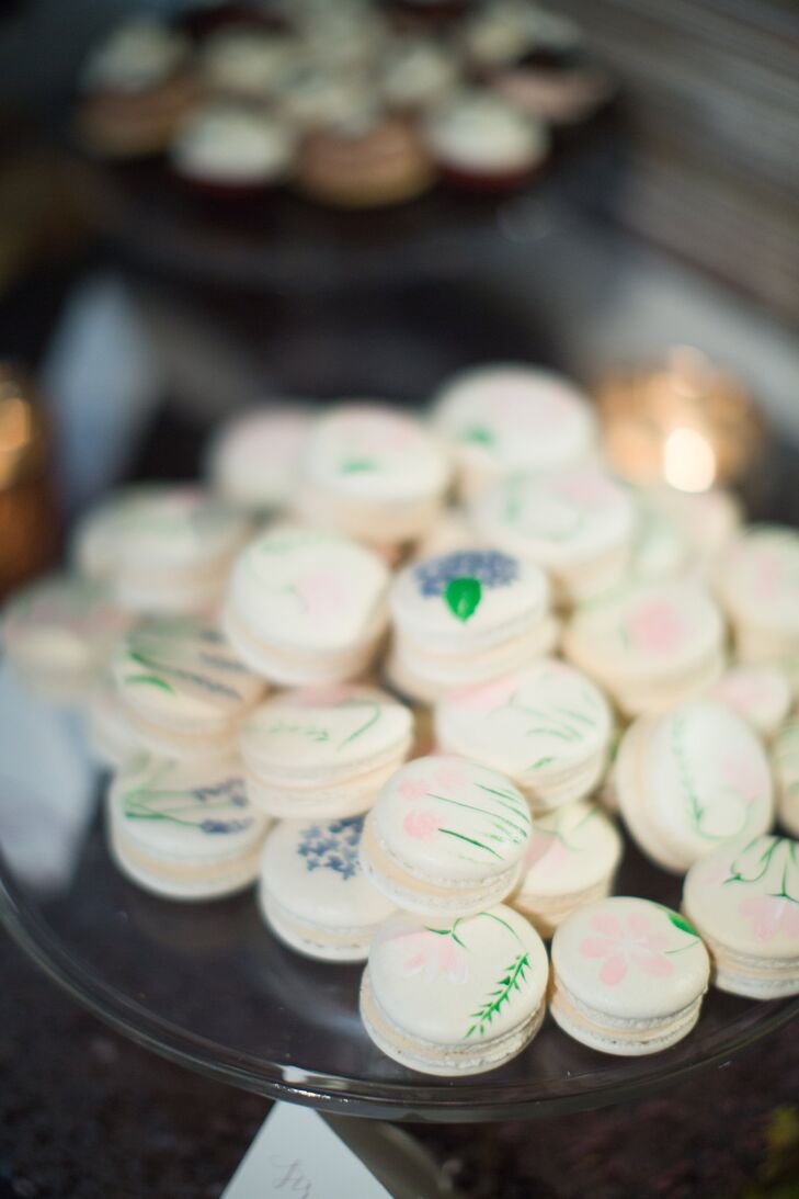 While Kathleen and Aaron had a two-tier cake made for the traditional cake cutting, they treated guests to a comprehensive dessert bar overflowing with decadent treats. Hand-painted macarons captured the essence of the spring season, while sweets like Buckeyes (chocolate peanut butter balls) and mini strawberry cheesecake jars showed off some of the couple’s personalities.