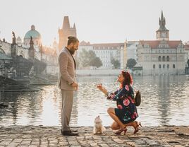 Woman proposing to man with dog