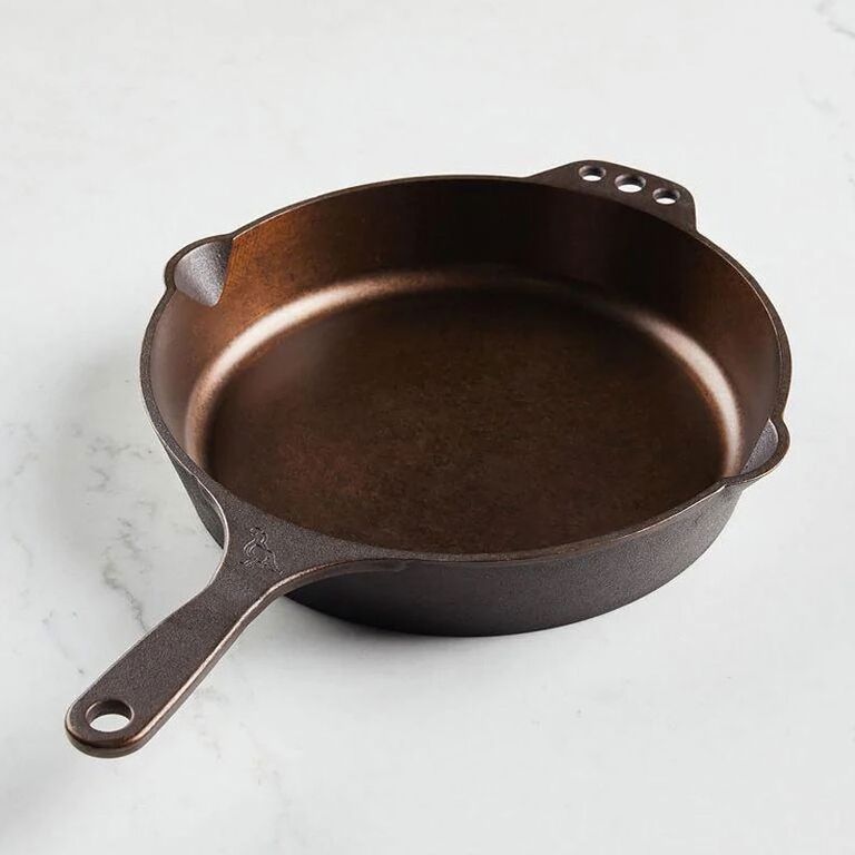 Cast iron skillet with bronze-hued polished interior 19-year anniversary traditional gift
