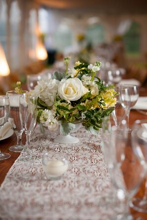 Lace Table Runners and White and Yellow Flower Arrangements