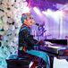 Entertainer and Impersonator "Almost Elton John" Performs on the Piano