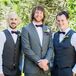 Groom and Groomsmen in Gray Suits with Plum Accents