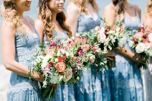 Bridesmaids in Light Blue Dresses With Colorful Bouquets