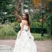 Bride in a Dramatic and Voluminous Maggie Sottero Wedding Dress