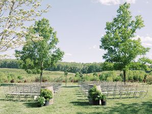 Garden Wedding Ceremony Setup With Wrought Iron Chairs