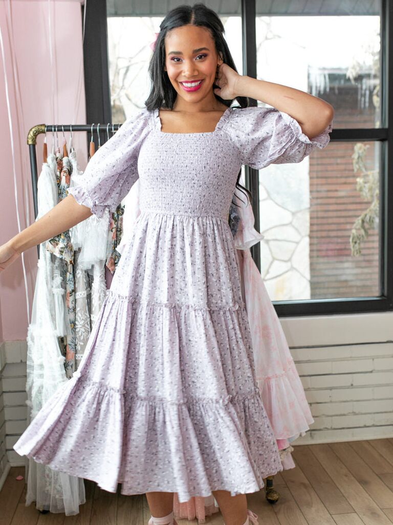 Ivy City Co. lavender floral wedding guest dress with puffed sleeves, smocked bodice and tiered skirt