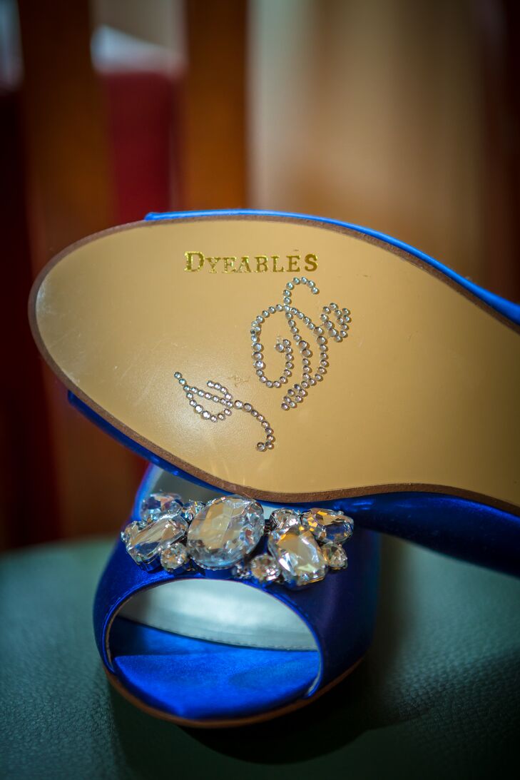 Emily added blue crystal "I do" appliqués to the soles of her blue Dyeable bridal shoes.