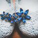 "I had two something blues: in my hair I wore a blue jeweled flower clip that belonged to my great grandmother and I wore light blue crocheted flats," says Vicki.