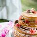 Three-Tier Naked Cake with Strawberries and Roses