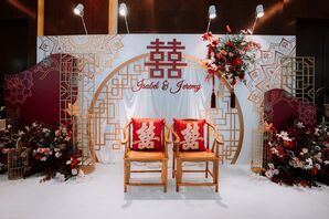 Stage With Chairs for Bride and Groom, Gold Arch, Chinese Characters, Flowers and Backdrop