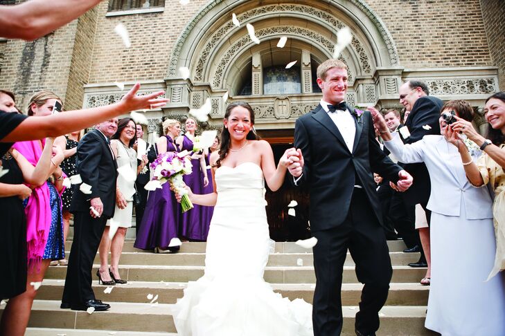 Ceremony site: St. John Cantius Parish, Cleveland, OH  Reception site: Rock and Roll Hall of Fame and Museum, Cleveland, OH   Photography: James and Genevieve Nisly/Genevieve Nisly Photography  Videography: Sunshine Video Productions Consultant: Kirkbrides Wedding Planning & Design  Gown: Vera Wang, Matina's, Beachwood, OH  Hair: Michele Grech/Grech's Hairstyling Salon  Makeup: Roni Lynn Klein/Roni Lynn Day Spa  Veil: Custom, Homa Creations, Matina's, Beachwood, OH  Shoes: Rene Caovilla  Bridesmaid Dresses: Jim Hjelm, Matina's Beachwood, OH  Formalwear: Groom: Corneliani, Family Britches, New Canaan, CT; Groomsmen: Men's Wearhouse  Stationery: Hope Fromson; Calligraphy: Susan Cone Porges/The Art Studio  Flowers: Forest Woods  Rentals: Linens, chairs: Party Décor  Cake: Phyllis Lester Designs Catering: Executive Caterers  Music: Ceremony: Stephanie and Tiffany Marchak; Cocktail hour: Esto Jazz/Jerry Bruno Productions; Reception: The Orchestra/Jerry Bruno Productions Transportation: American Limousine Services  Honeymoon: France  Registries: Bed Bath & Beyond; Bloomingdale's; Shulan's; Williams-Sonoma 