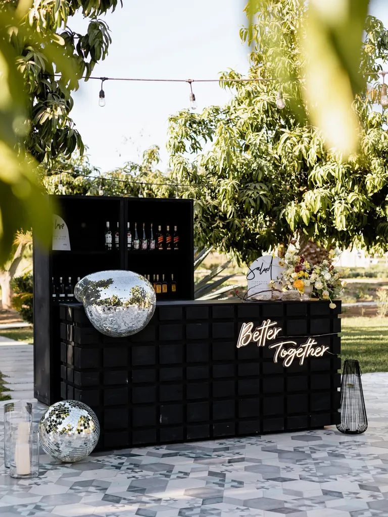 Disco Ball, Neon Sign and Lantern Display wedding lighting idea